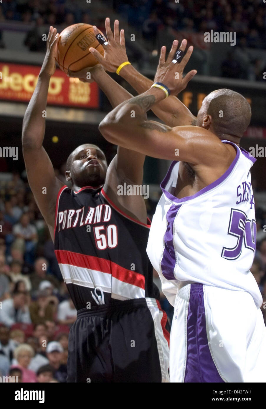 Dec 26, 2005; Sacramento, CA, USA; Portland Trail Blazer ZACH RANDOLPH shoots over Sacramento King BRIAN SKINNER in the second half of basketball action on Dec. 26, 2005 at Arco Arena in Sacramento, CA. Portland beat the Kings 105-92, leaving Sacramento at 10-17 for the season. Mandatory Credit: Photo by Carl Costas/Sacramento Bee/ZUMA Press. (©) Copyright 2005 by Sacramento Bee Stock Photo