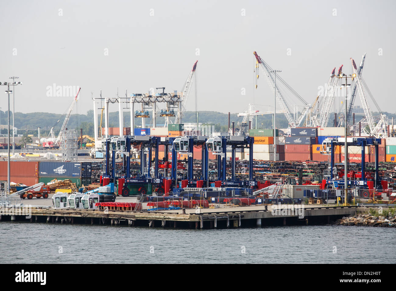 An industrial shipping operation at a busy port Stock Photo