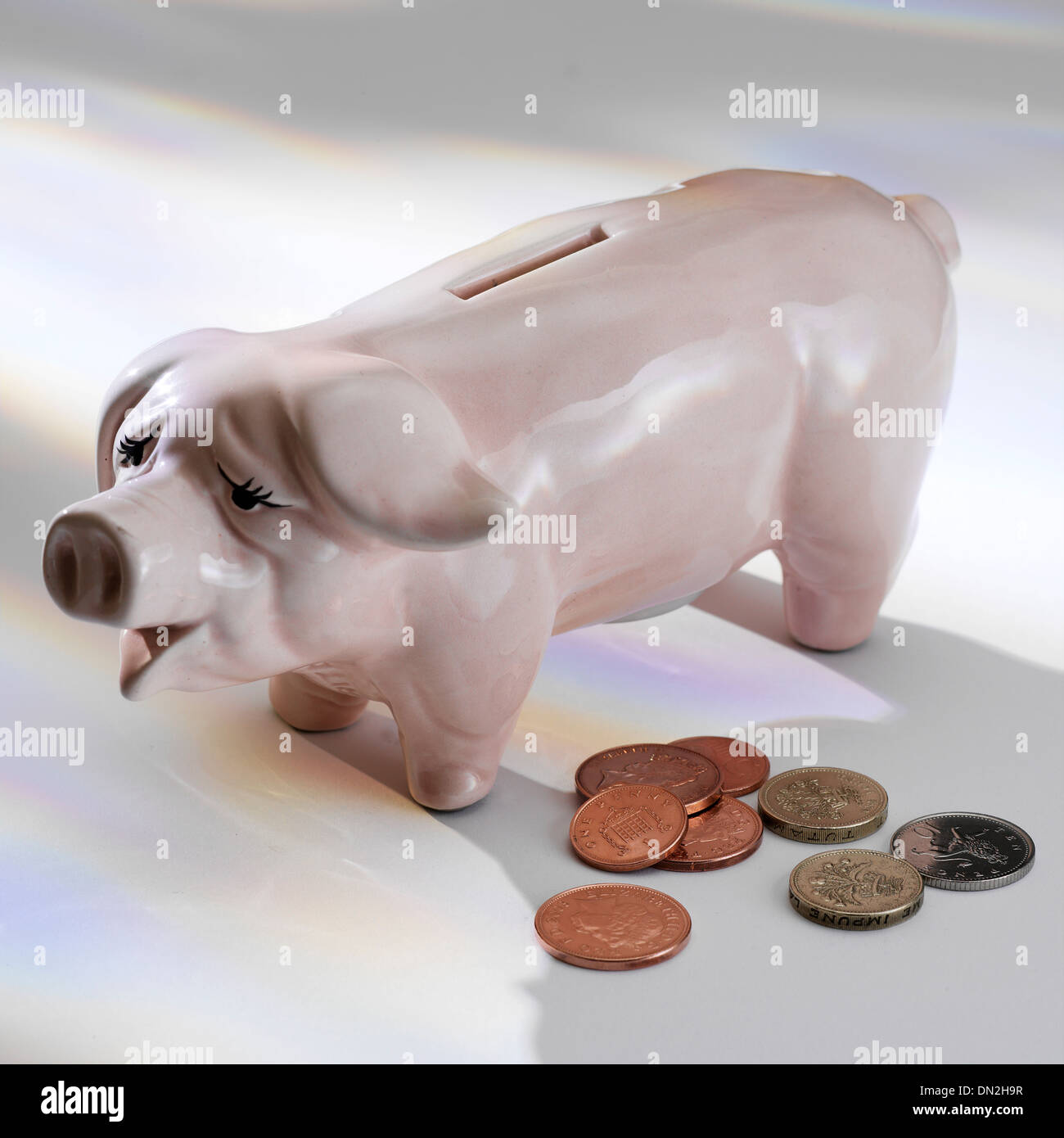 Piggy Bank with Coins Stock Photo