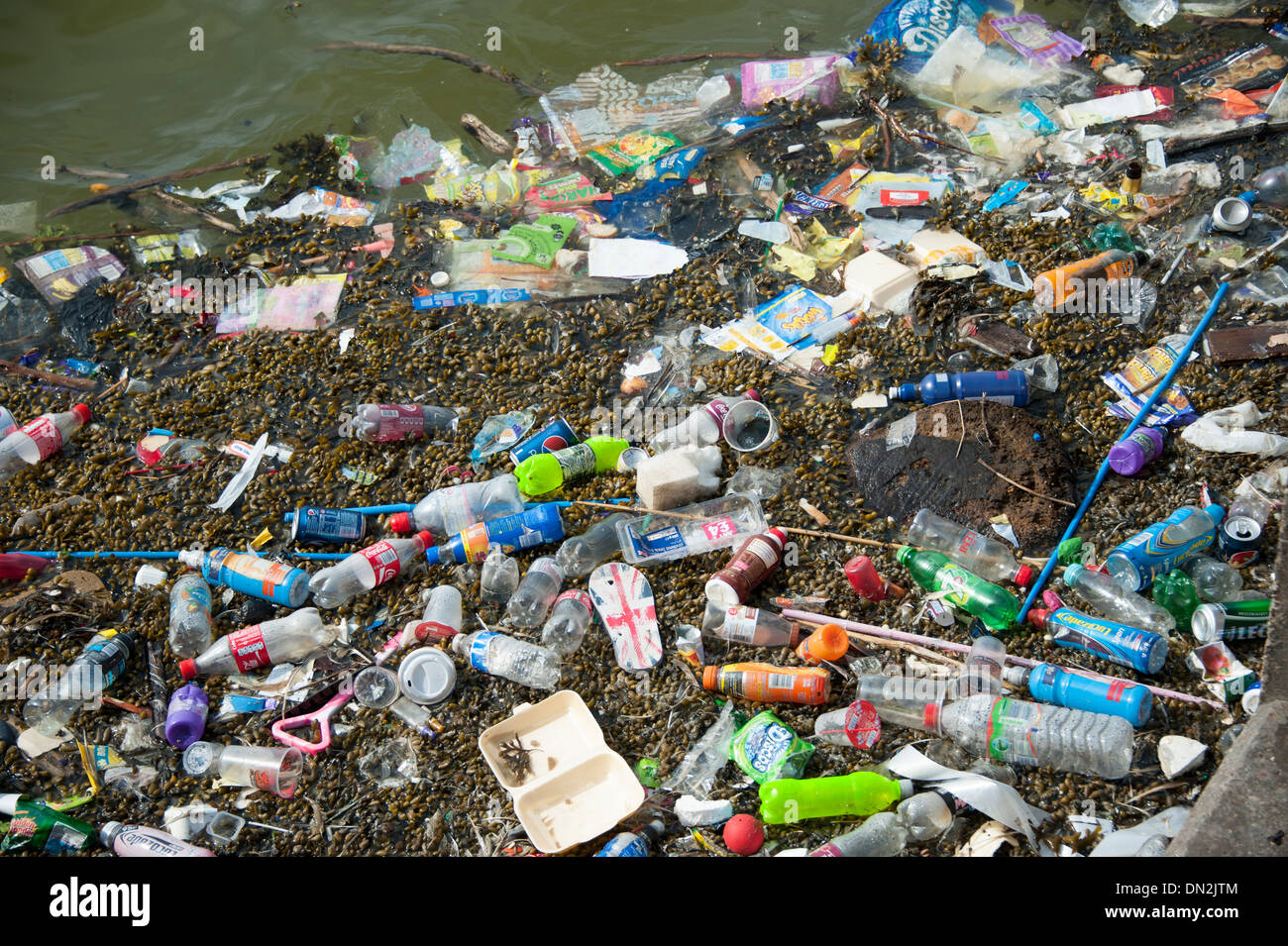 Plastic waste pollution in ocean sea water man made Stock Photo - Alamy