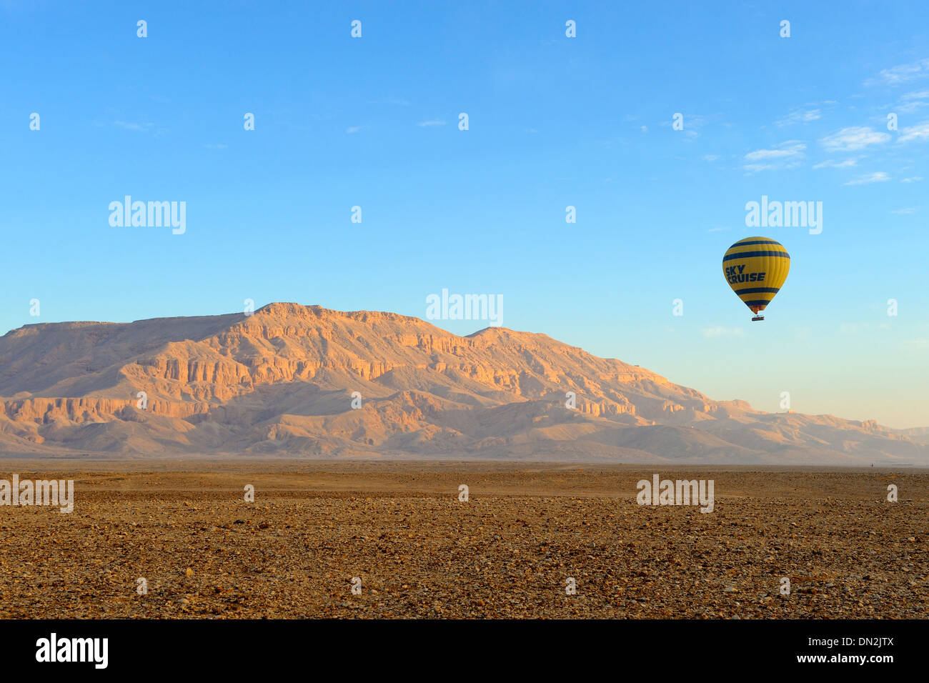 Early morning hot air balloon ascent over west bank of Luxor, Upper Egypt Stock Photo