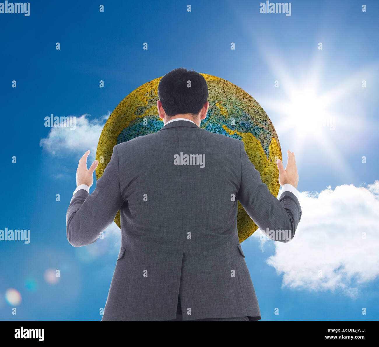 Composite image of businessman with arms raised Stock Photo - Alamy