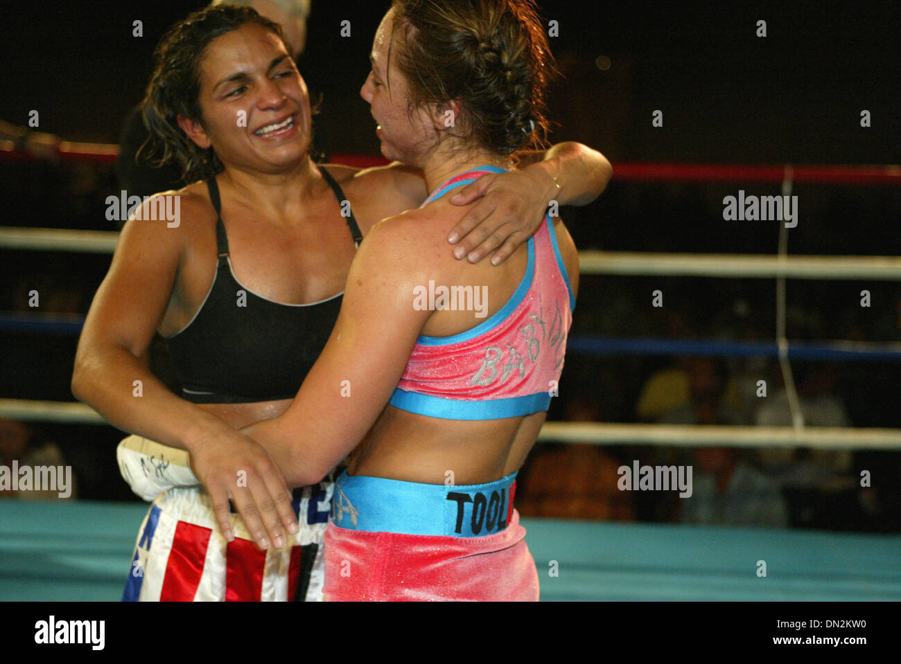 Aug 31, 2006; Lake Tahoe, NV, USA; Harrahs Hotel and Casino in Lake Tahoe, Nevada Rock and Sock Productions all female professonal boxing series had five bouts with one WIBA World Flyweight Championship. ELENA' BABY DOLL'  REID (right) pink & Blue hugs MARY ' THE HEART ORTEGA ( left) after their ten round battle. REID  won a very tough ten round unanimous decision against the resil Stock Photo