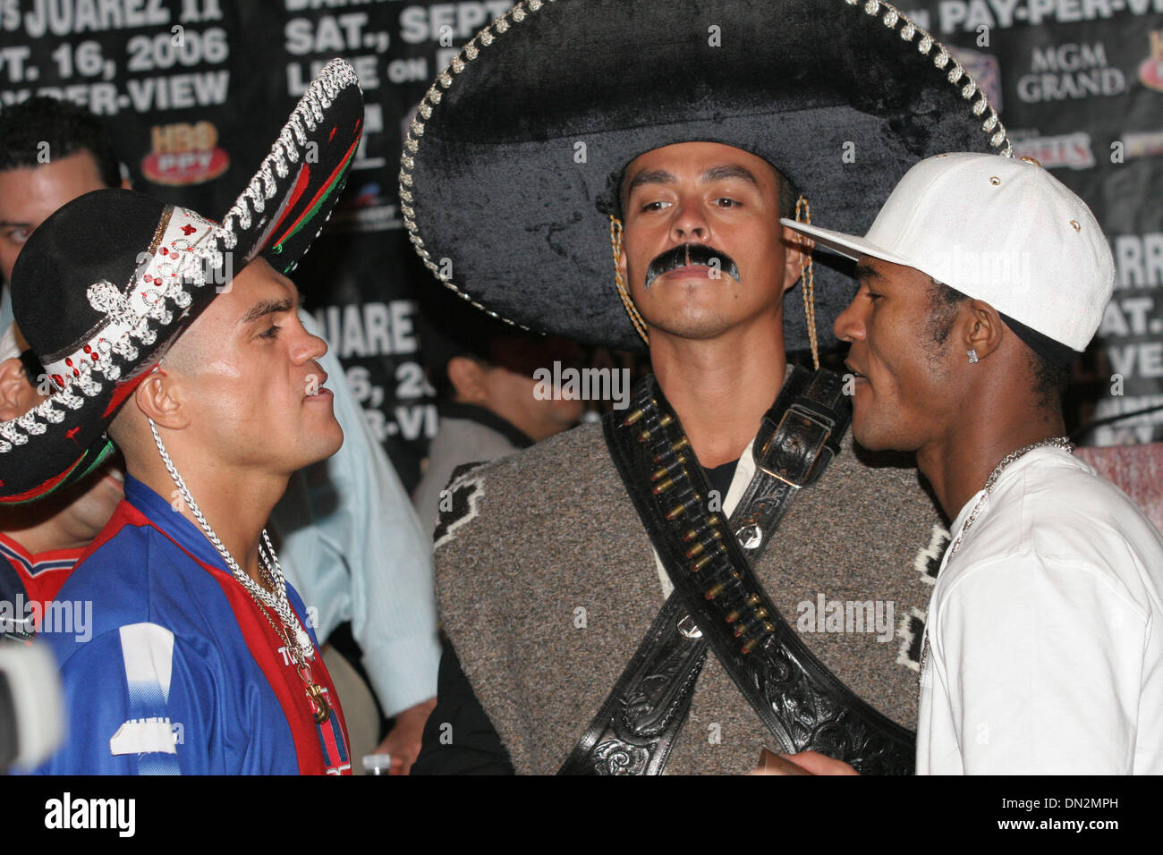 Sep 14, 2006; Las Vegas, NV, USA; BOXING: Facing off, fighters JORGE RODRIGO BARRIOS ( L) and JOAN GUZMAN (R) at the MGM Grand Hotel and Casino at at the Barrera vs Juarez ll press conference. Barrios will be defending his WBO Jr Lightweight Title against & GUZMAN. The fight will be on Saturday 09-16-06 at the MGM Grand Garden Arena and will be televised on Pay Per View. Mandatory  Stock Photo