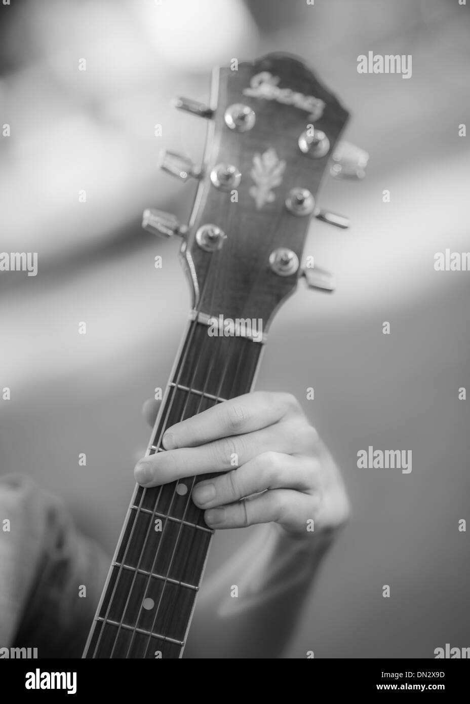 Hands with musical instrument Stock Photo