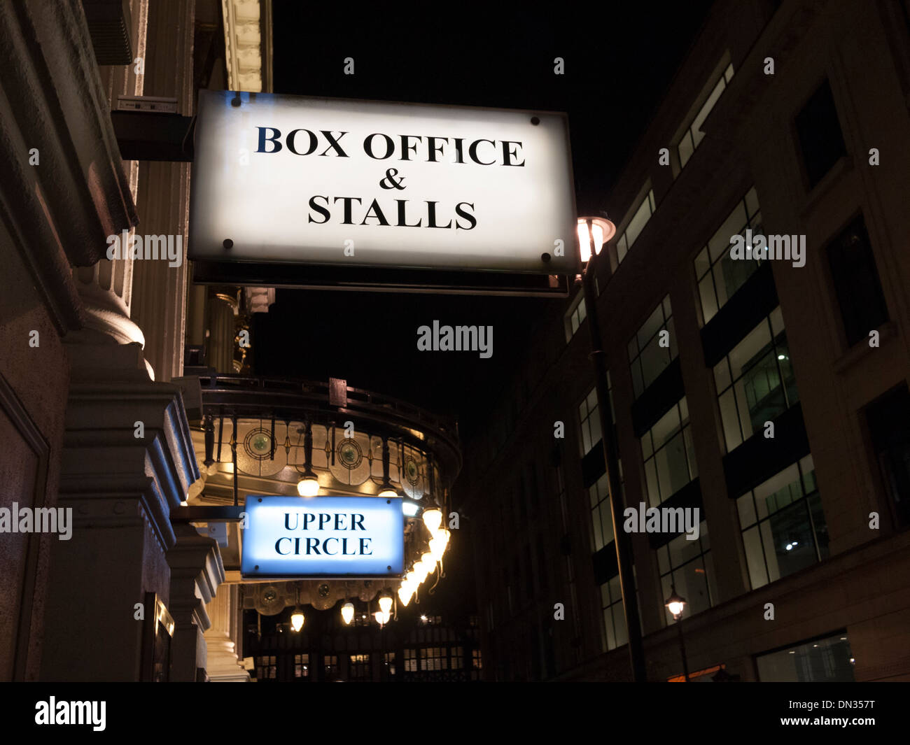 Box office and stalls signs lit up outside the London Palladium theatre at  night Stock Photo - Alamy