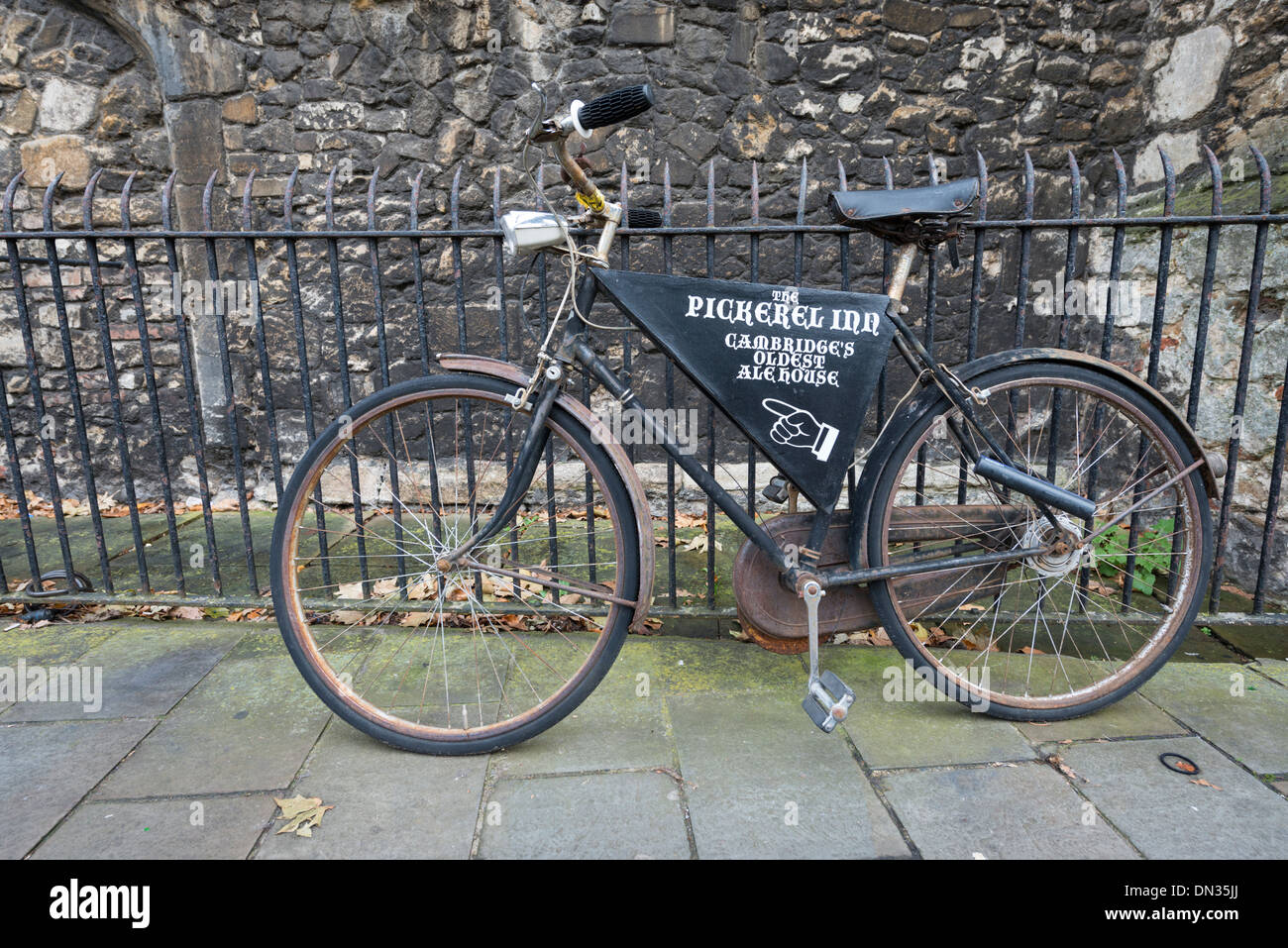 A traditional bicycle parked in Cambridge used as an advert for the Pickerel pub Stock Photo Alamy