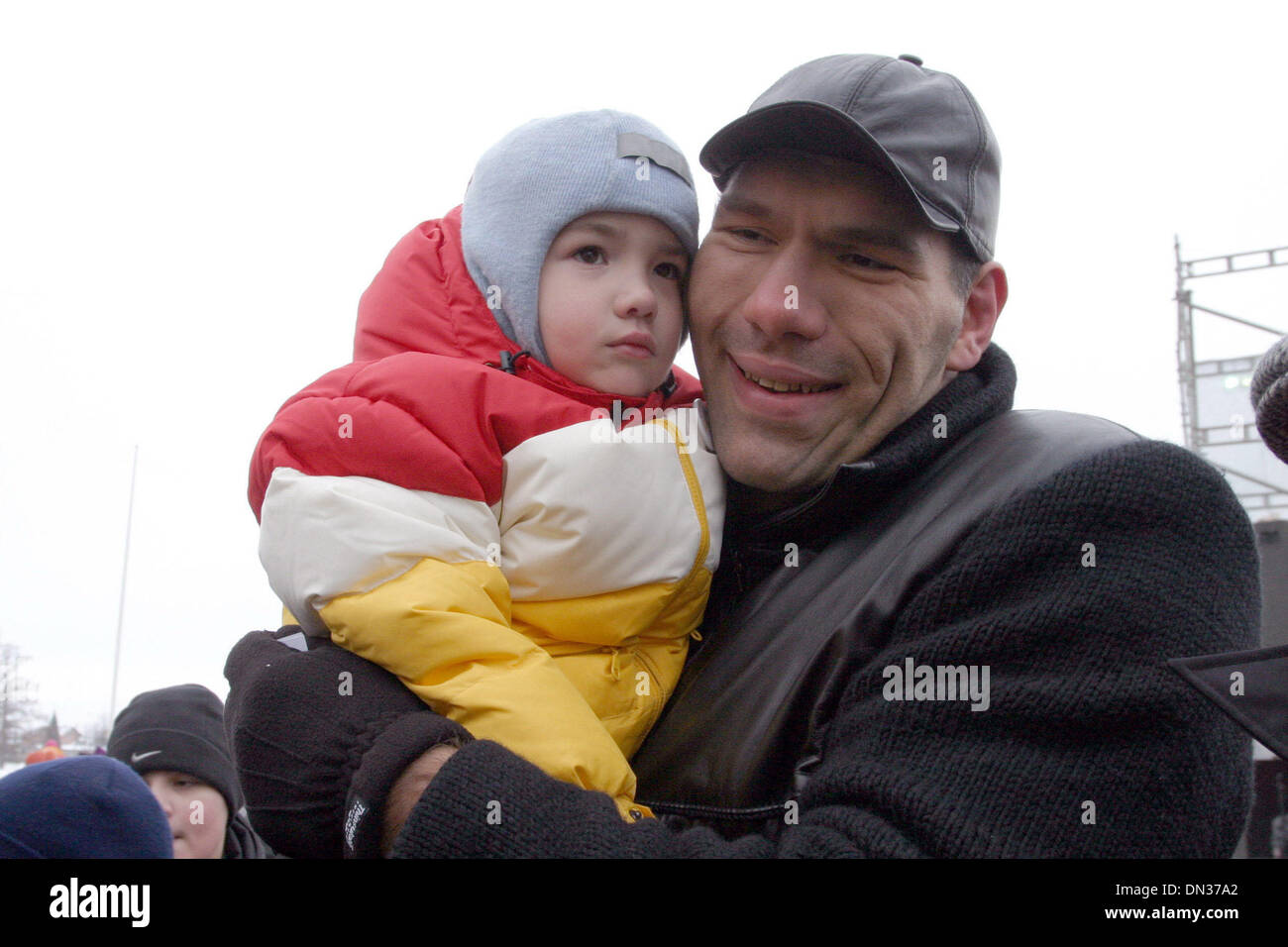 Russian boxer Nikolai Valuev - WBA superheavy weight boxing champion with his kid in his native town of St.Petersburg-RUSSIA.December 24, 2005.(Credit Image: © PhotoXpress/ZUMA Press) RESTRICTIONS: North and South America Rights ONLY! Stock Photo