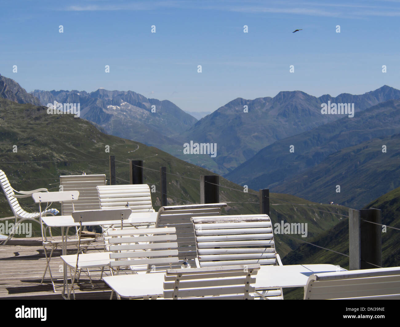 Hotel Furkablick, ca 2500 meter altitude high point of the Furkapass magnificent views terrace, table and chairs Switzerland Stock Photo