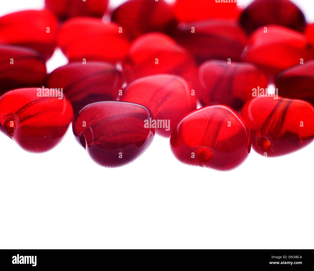 red heart beads isolated on white Stock Photo