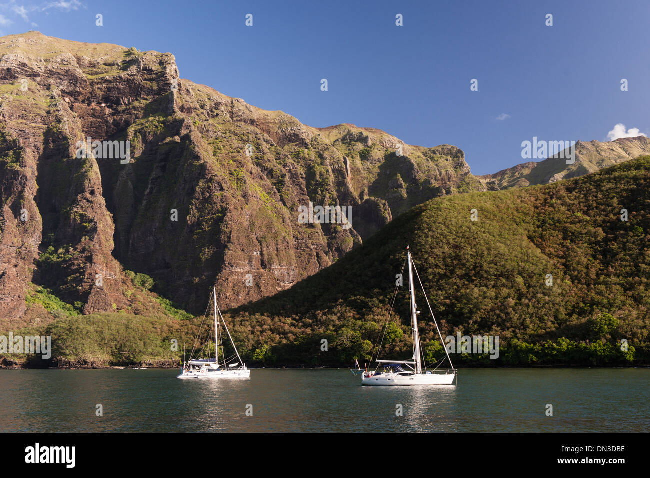 Two blue water cruising boats anchored in Bay de Taioa,  Niku Hiva  Marquesas. (Anchorage now commonly called Daniel's Bay) Stock Photo