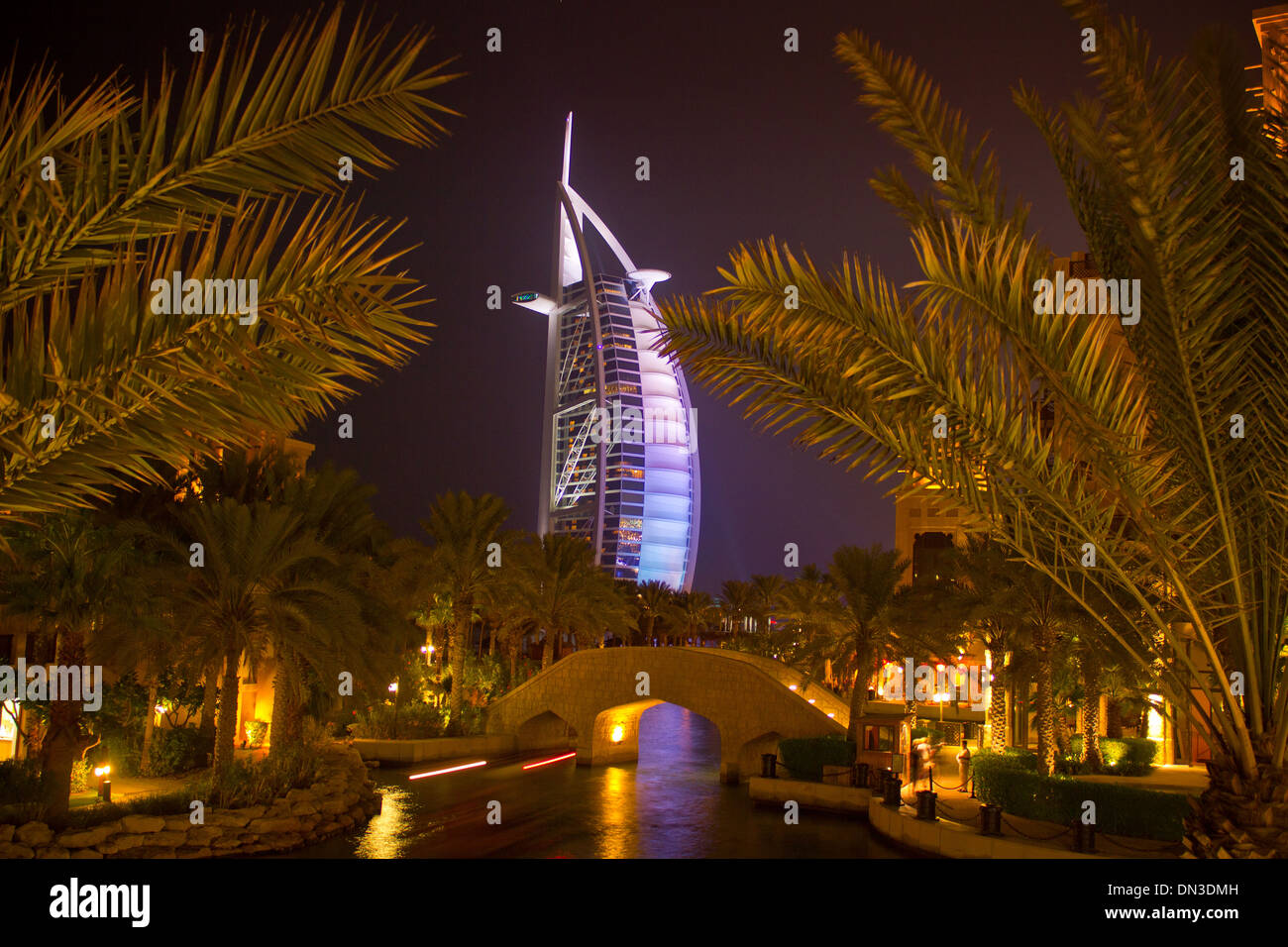Burj Al Arab and Madinat Jumeirah at night. Dubai United Arab Emirates Stock Photo