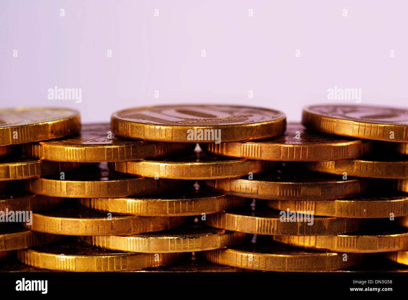 golden piles of coins close up texture Stock Photo