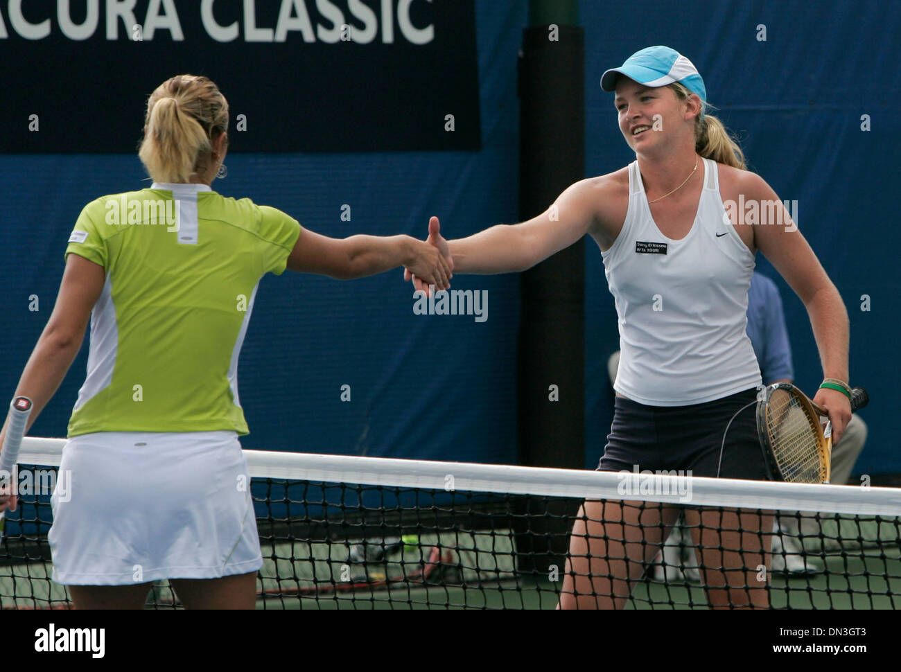 Jul 31, 2006; Carlsbad, CA, USA; COCO VANDEWEGHE, at right, shakes hands with KATERYNA BONDARENKO after losing to her. Mandatory Credit: Photo by Charlie Neuman/SDU-T/ZUMA Press. (©) Copyright 2006 by SDU-T Stock Photo