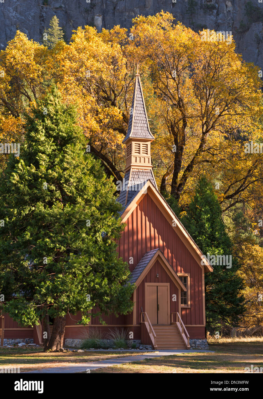 Yosemite Chapel surrounded by fall foliage, Yosemite Valley, California, USA. Autumn (October) 2013. Stock Photo