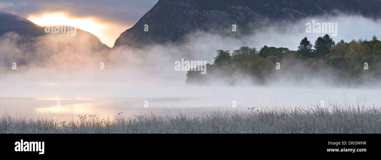 Mist shrouds Loweswater at sunrise, Lake District, Cumbria, England. Autumn (November) 2013. Stock Photo