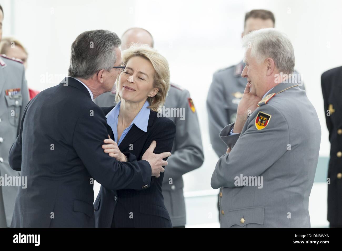 Berlin, Germany. 18th Dec, 2013. Chancellor Angela Merkel and Ursula von der Leyen (CDU), Minister of Defence, receives family members of the soldiers as well as policemen who are in the foreign assignment, to a Christmas conversation at the Chancellery in Berlin. / Picture: (r) Thomas de Maiziere (CDU), Minister of Interior, Ursula von der Leyen (CDU), Minister of Defence, and Volker Wieker, Chief of Staff of the armed forces.Photo: Reynaldo Paganelli/NurPhoto Credit:  Reynaldo Paganelli/NurPhoto/ZUMAPRESS.com/Alamy Live News Stock Photo