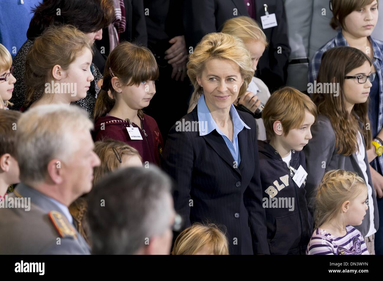 Berlin, Germany. 18th Dec, 2013. Chancellor Angela Merkel and Ursula von der Leyen (CDU), Minister of Defence, receives family members of the soldiers as well as policemen who are in the foreign assignment, to a Christmas conversation at the Chancellery in Berlin. / Picture: Ursula von der Leyen (CDU), Minister of Defence, and the family menbers of soldiers.Photo: Reynaldo Paganelli/NurPhoto Credit:  Reynaldo Paganelli/NurPhoto/ZUMAPRESS.com/Alamy Live News Stock Photo