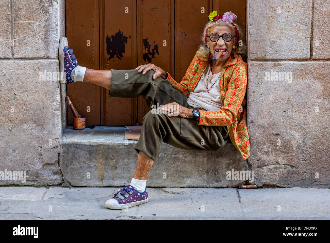 Elderly Cuban Woman Sitting In A Doorway, Havana, Cuba Stock Photo