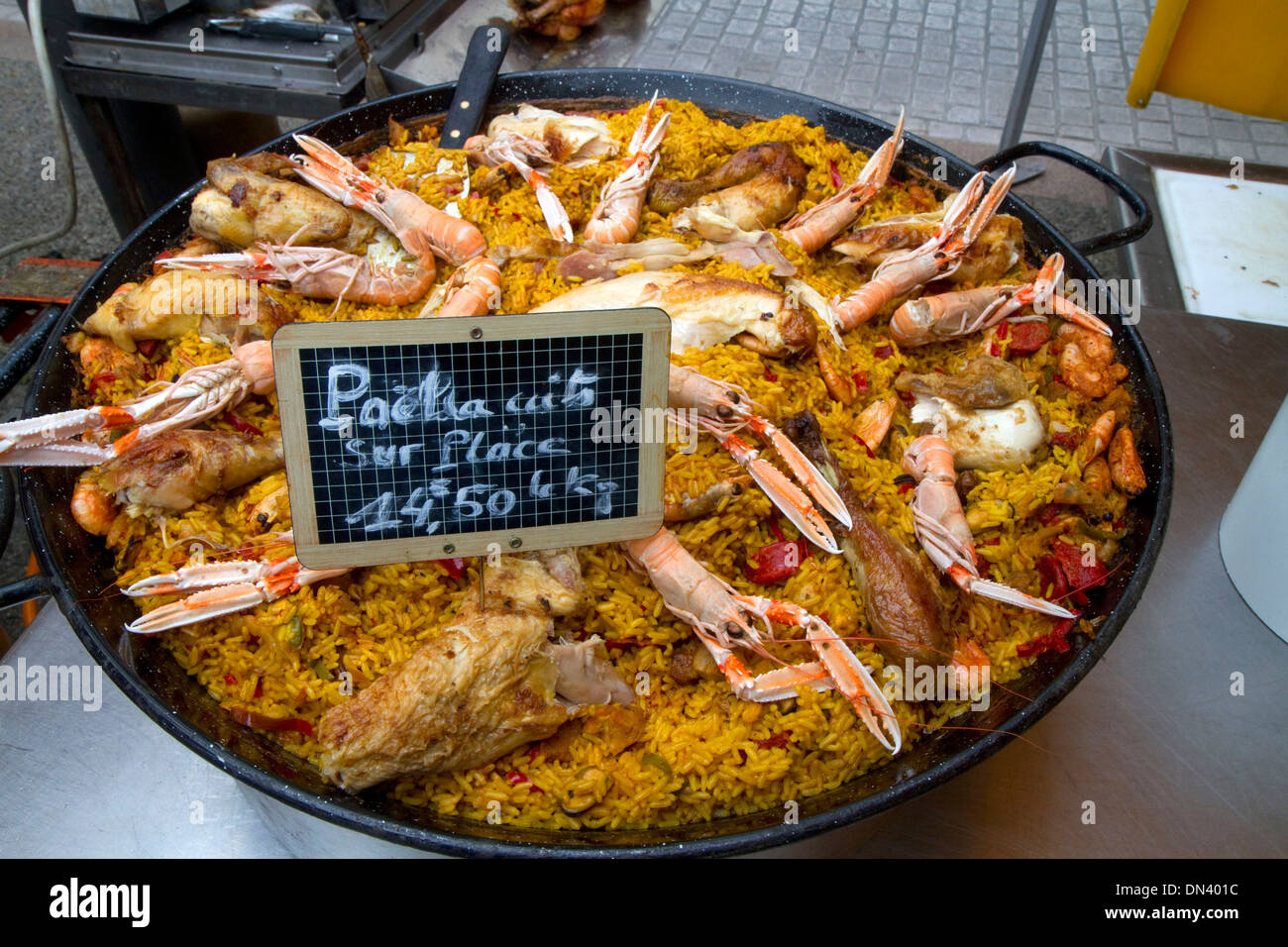 A large pan of paella for sale in a Basque market at Saint-Jean-de-Luz in  the Basque province of Labourd, southwestern France Stock Photo - Alamy