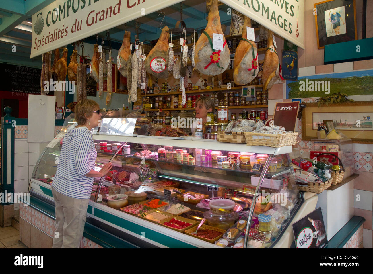 Charcuterie selling cured meats in a Basque market at Saint-Jean-de-Luz in the Basque province of Labourd, southwestern France. Stock Photo