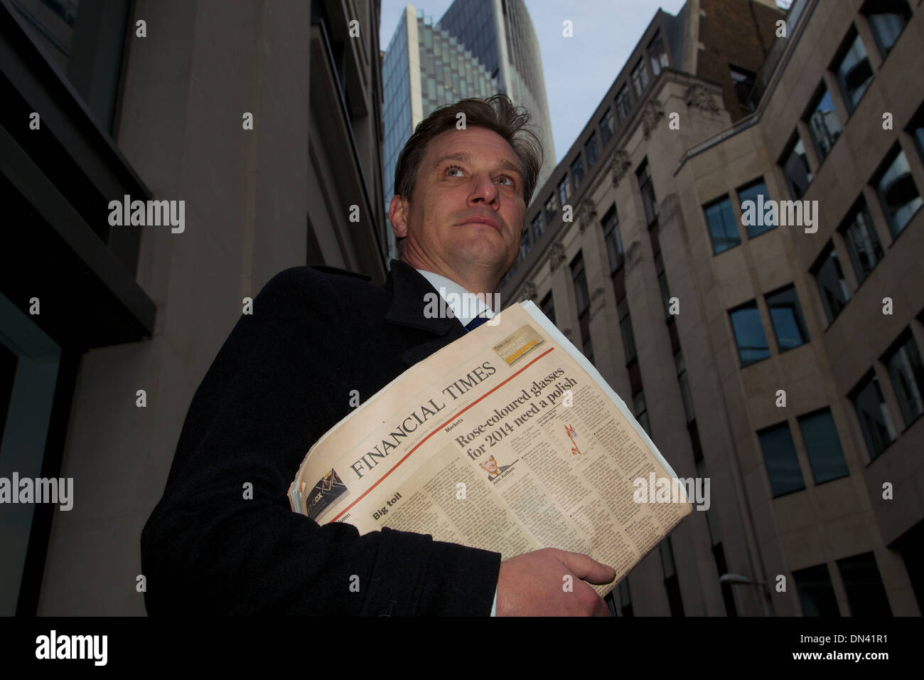 A City Of London Businessman Carrying The Financial Times Stock Photo 