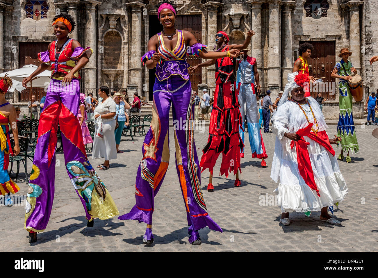 Street Entertainers Dancing On Stilts, Old Havana, Havana, Cuba Stock