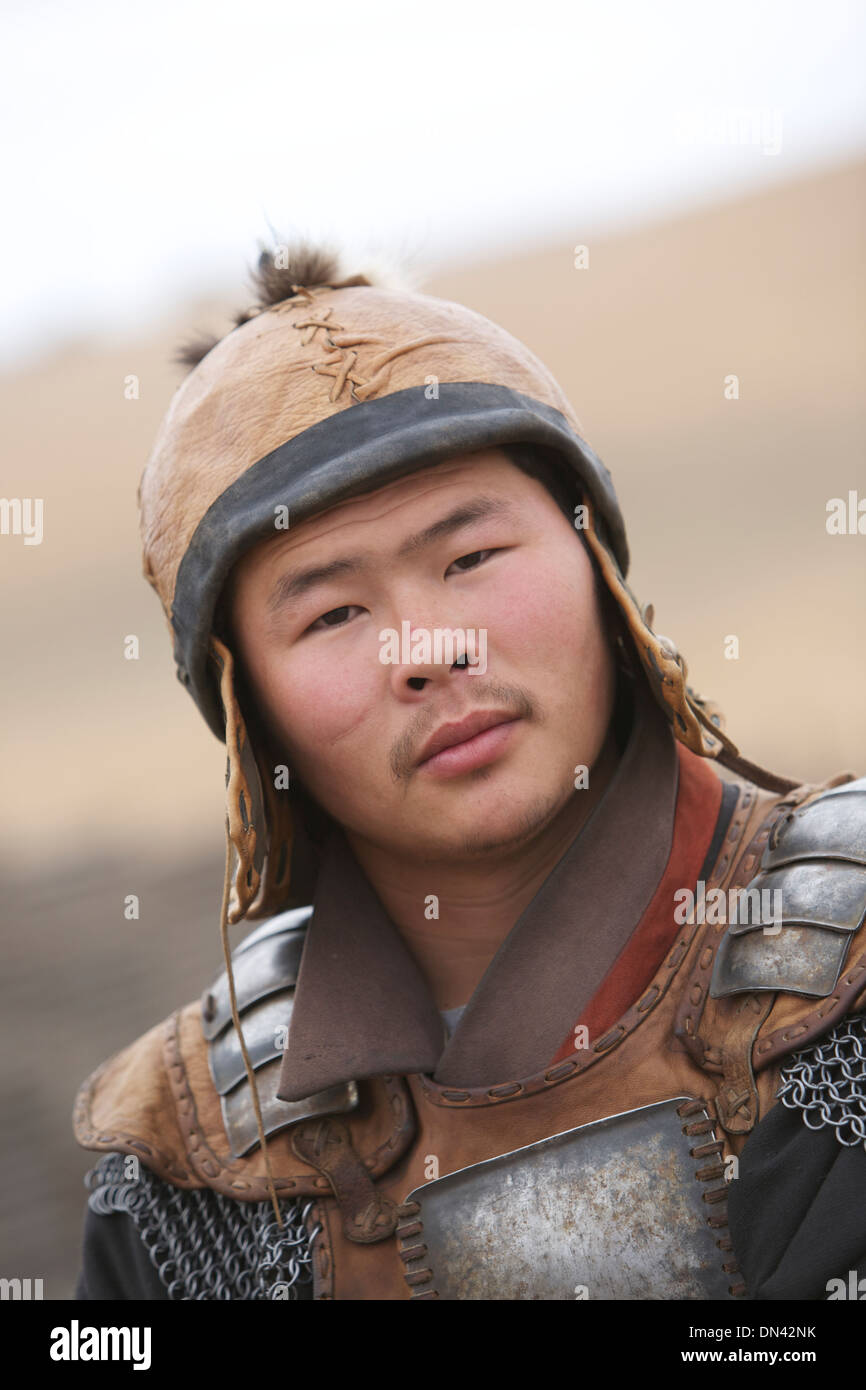 Mongolian man dressed in Ghengis Kahn warrior costume Stock Photo