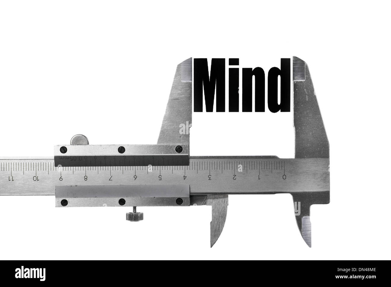 Picture of a caliper, measuring the word "Mind Stock Photo Alamy