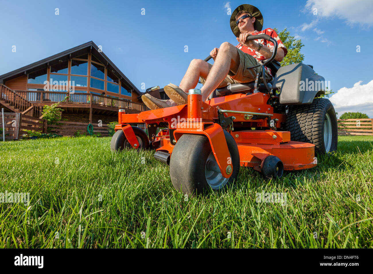 Orange lawn mower hi res stock photography and images Alamy