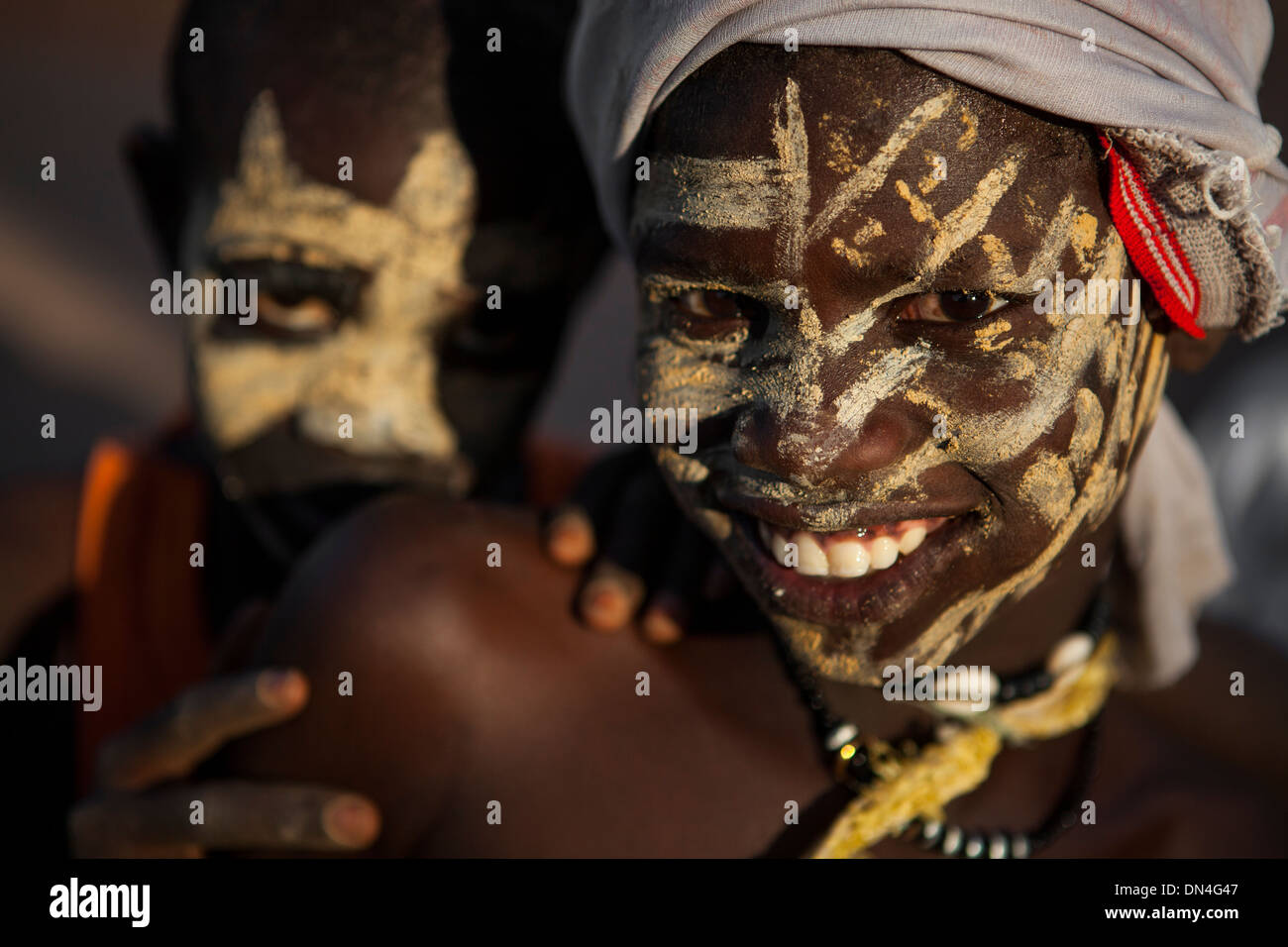 Friends playing the game 'white man' in Senegal, West Africa. Stock Photo