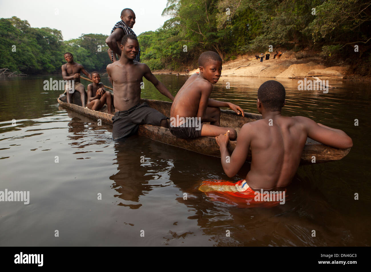 Angelique tree boat in a shallow river in Bo region, Sierra Leone. Stock Photo