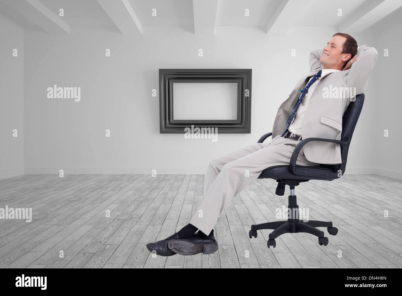 Man leaning back in chair hires stock photography and images Alamy