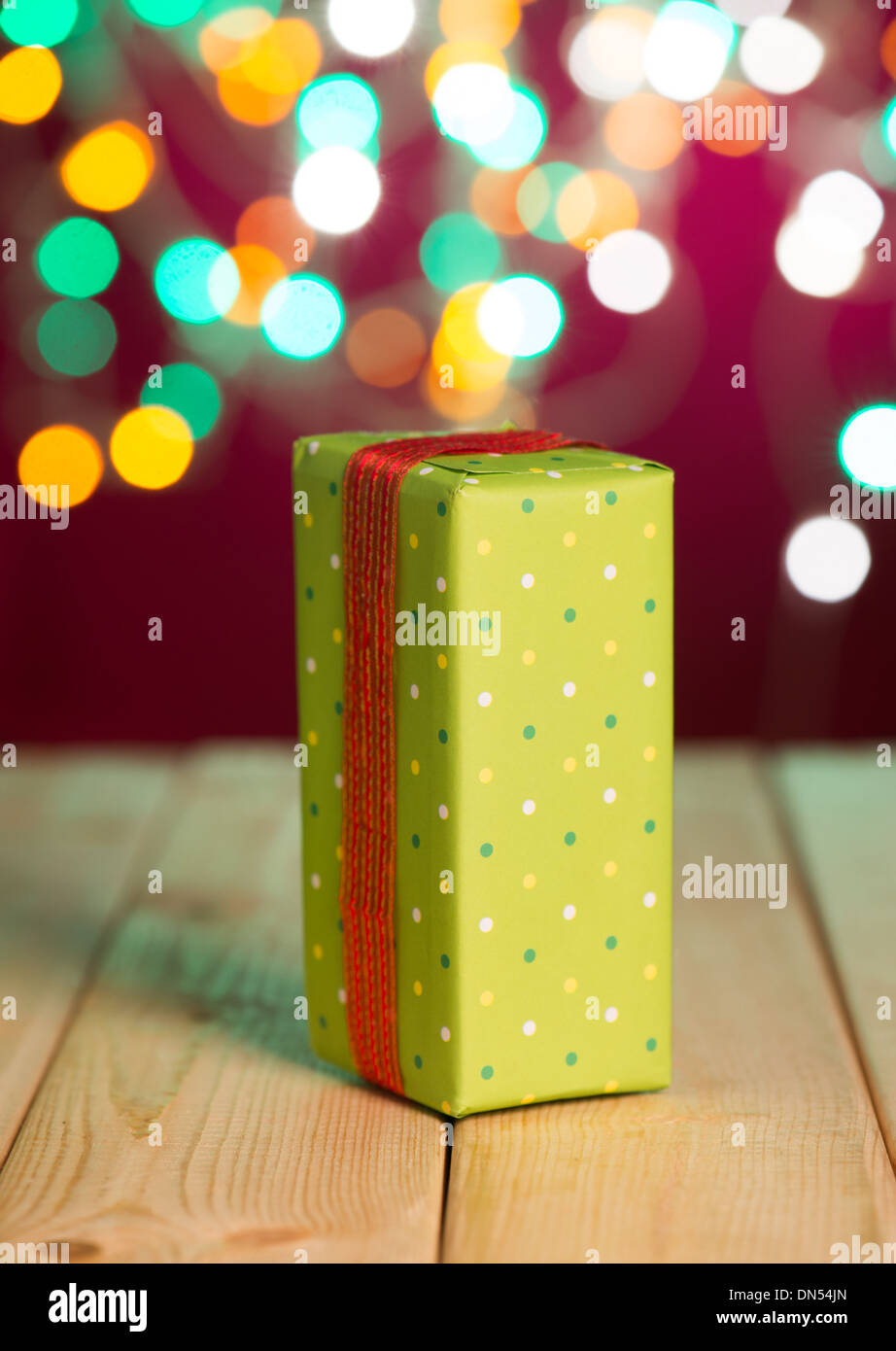 christmas-decorations-and-presents-with-background-lights-stock-photo