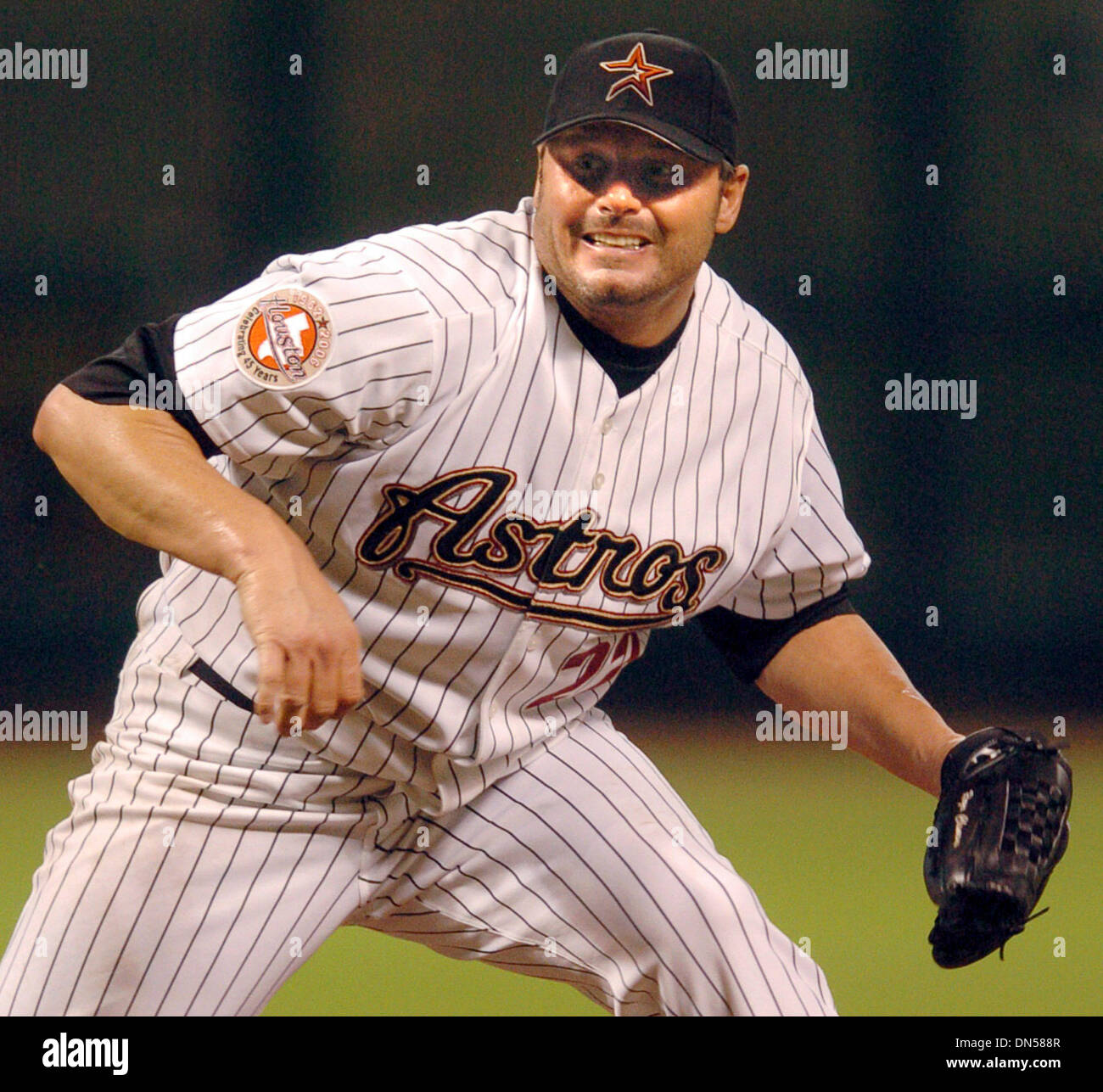 Jun 22, 2006; Houston, TX, USA; Astros ROGER CLEMENS winches as he waits  for the strike call from the ump bottom of the 3rd inning against the  Minnesota Twins at Minute Maid