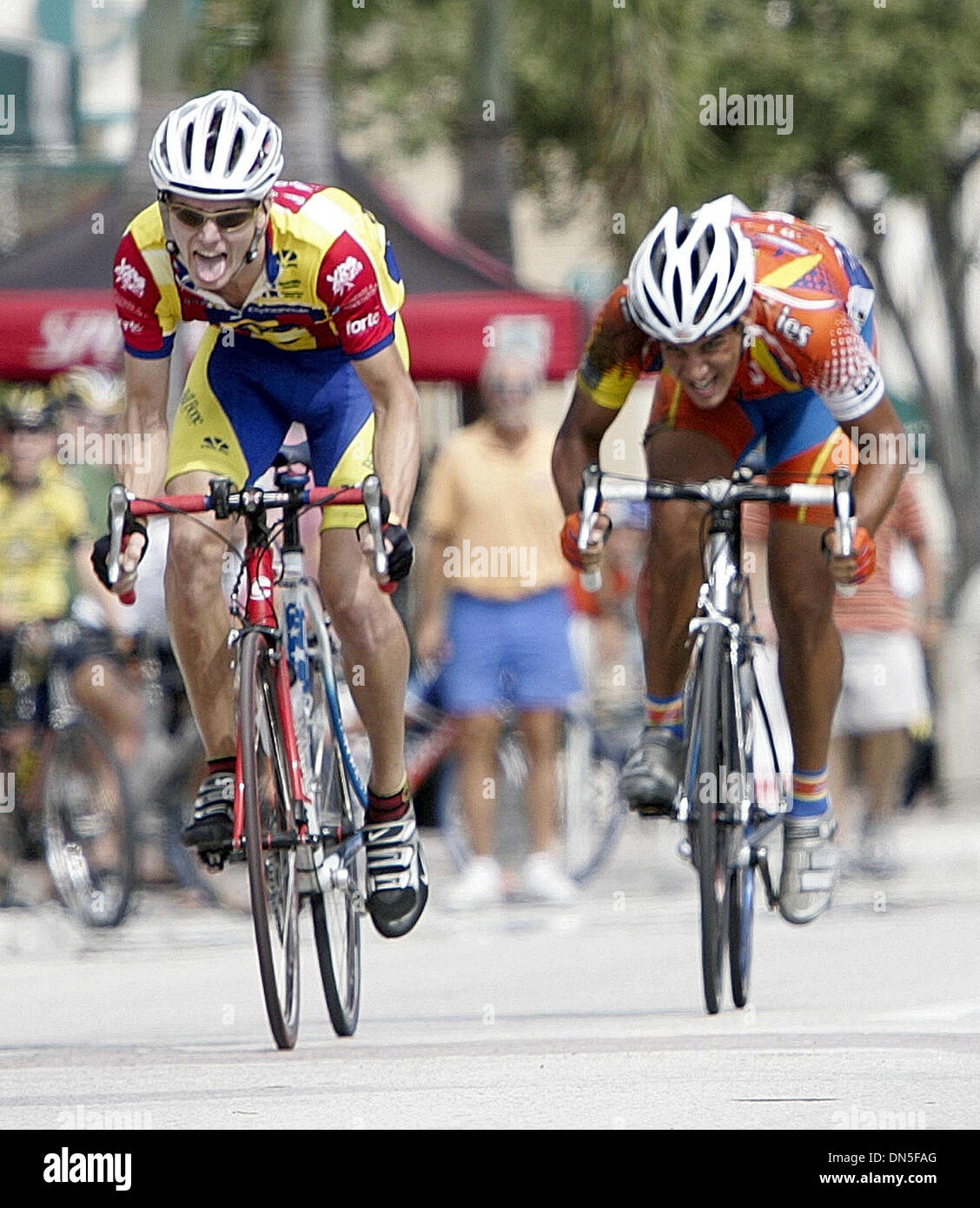 Sep 30, 2006; Lake Worth, FL, USA; Bicycle Show & Shine Downtown Lake Worth took place this afternoon in Lake Worth, Saturday, September 30, 2006. Victor Alber (left), riding for Bill Bone Bicyclery edged out second place finisher Miguel Hernandez (right), riding for l.aser-es in this afternoon's Men's Category 5 race. Mandatory Credit: Photo by Thomas Cordy/Palm Beach Post/ZUMA Pr Stock Photo