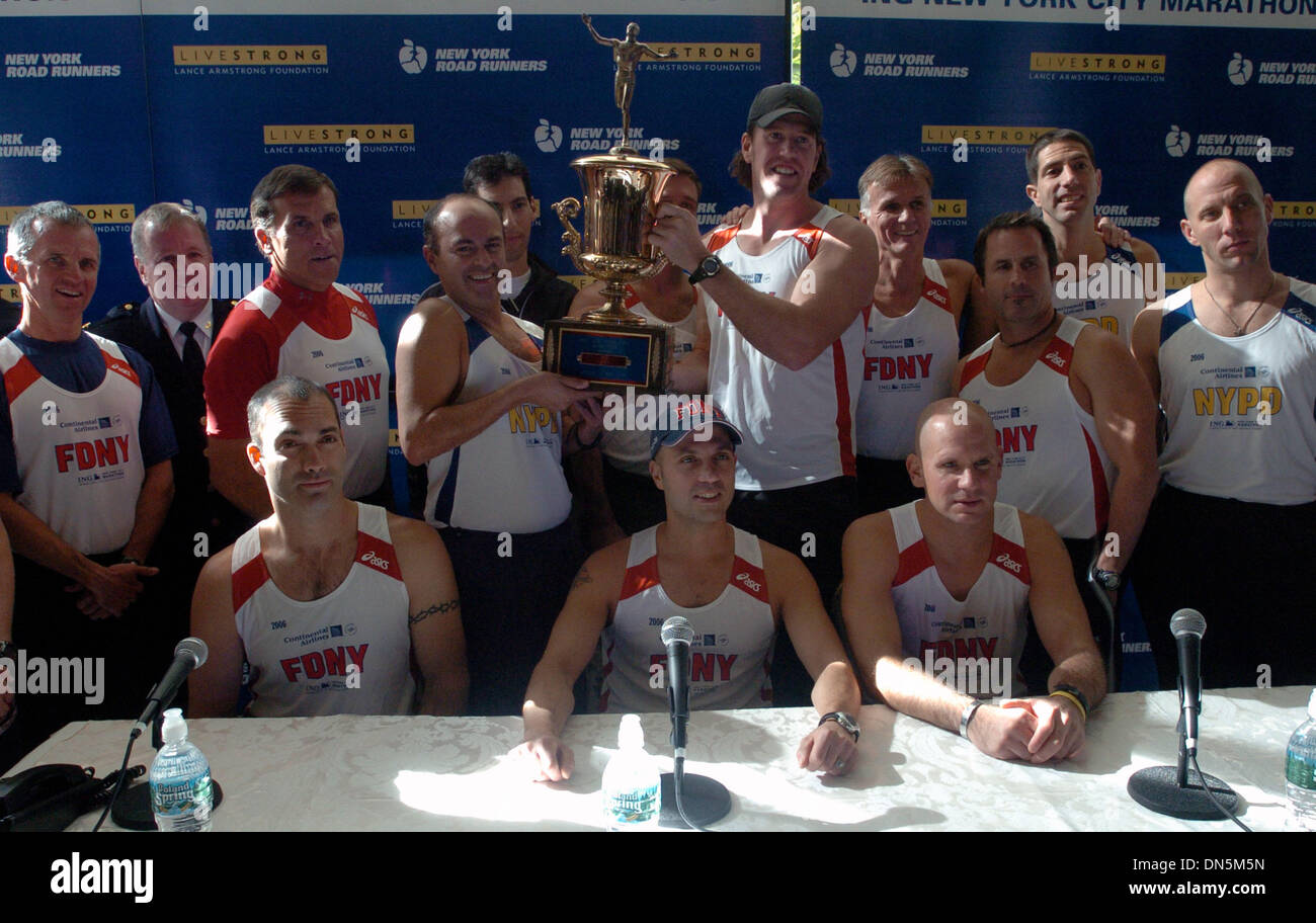 Nov 03, 2006; MANHATTAN, NY, USA; Members of the FDNY and NYPD hold up ...
