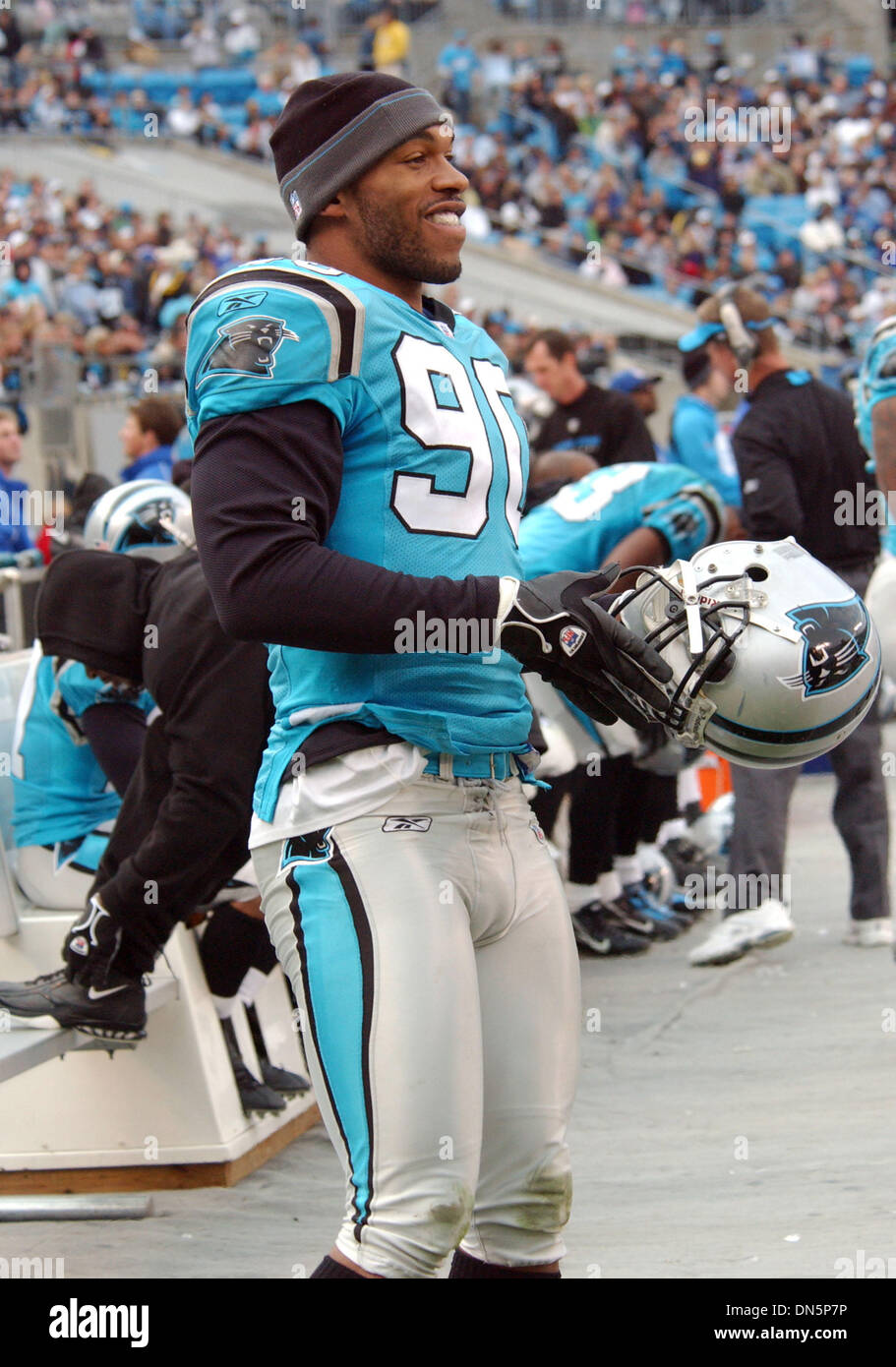 Nov 19, 2006; Charlotte, NC, USA; Carolina Panther Football Player # 90  JULIUS PEPPERS takes a moment on the sideline as the NFL Football team The Carolina  Panthers beat the St. Louis