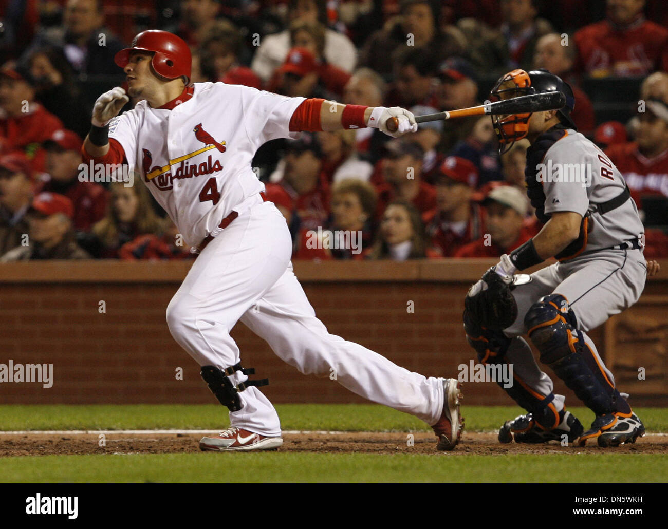 Oct 24, 2006 - St. Louis, MO, USA - St. Louis Cardinals' YADIER MOLINA (4)  hits a double in the sixth inning in game three of the World Series against  the Detroit, image size:1300x1030