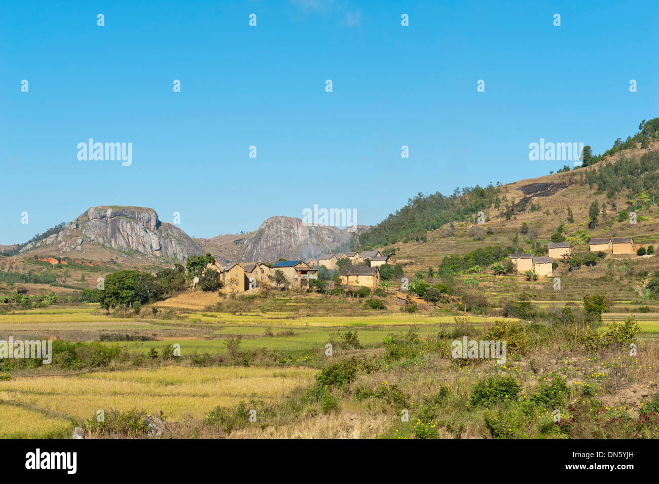 Landscape, village of the Betsileo people with terraced rice paddies, rocky mountains, Anja-Park near Ambalavao, Madagascar Stock Photo