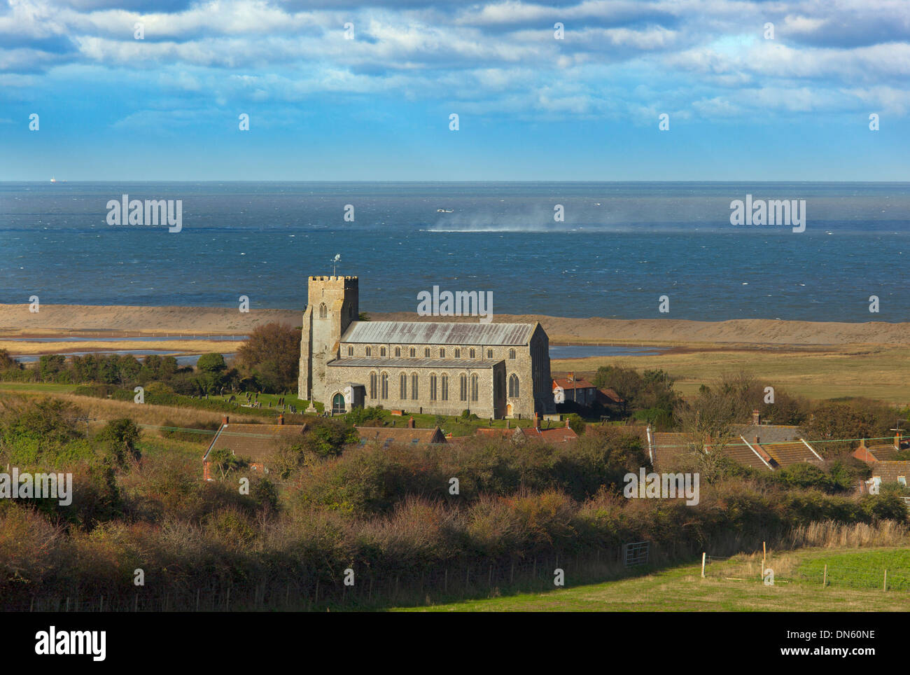 Salthouse Church and the North Norfolk Coast from Salthouse heath Stock