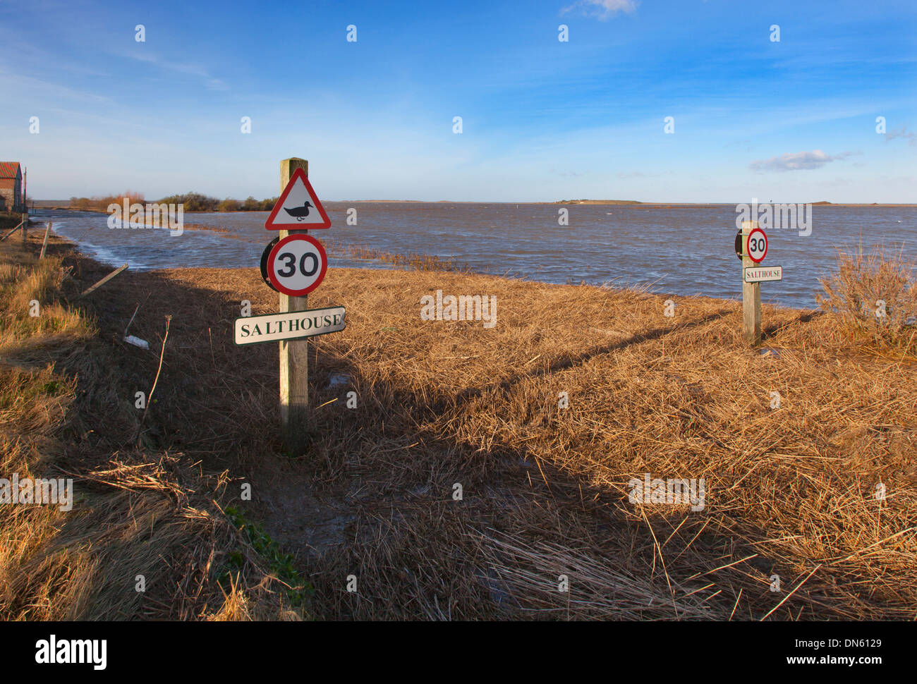 Salthouse Coast road and marshes flooded after a North Sea tidal surge North Norfolk Stock Photo