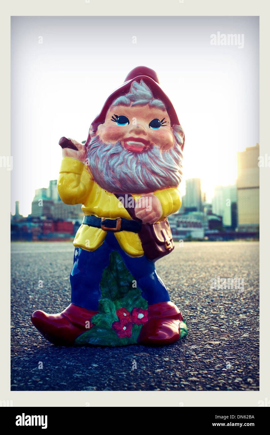Gnome figurine on city street - Smartphone Captured Stock Image