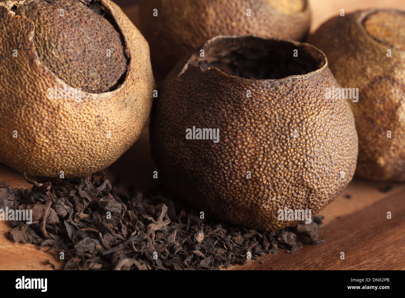Pu-erh. Chinese dark tea packed in dried mandarins Stock Photo