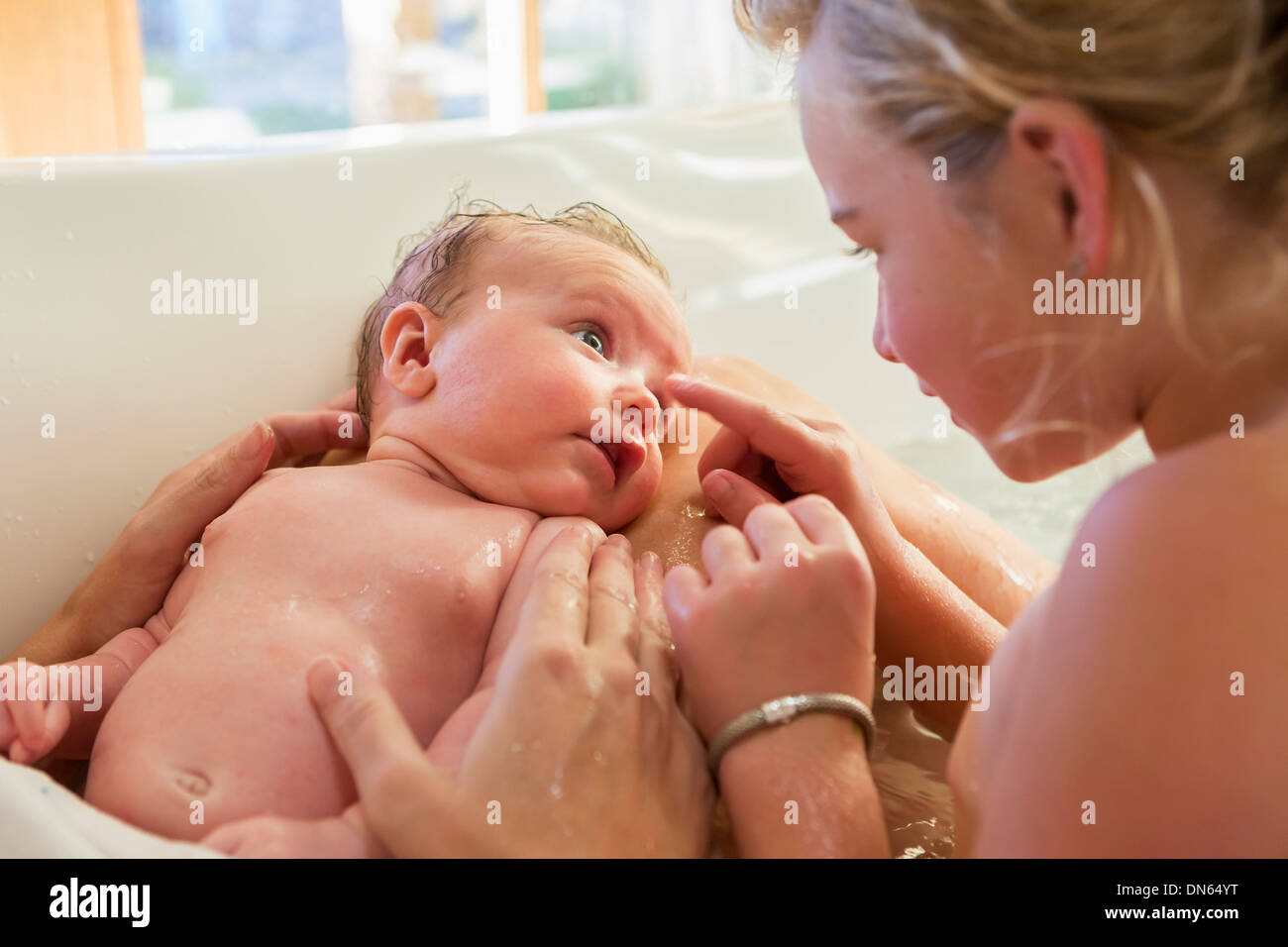 washing a newborn