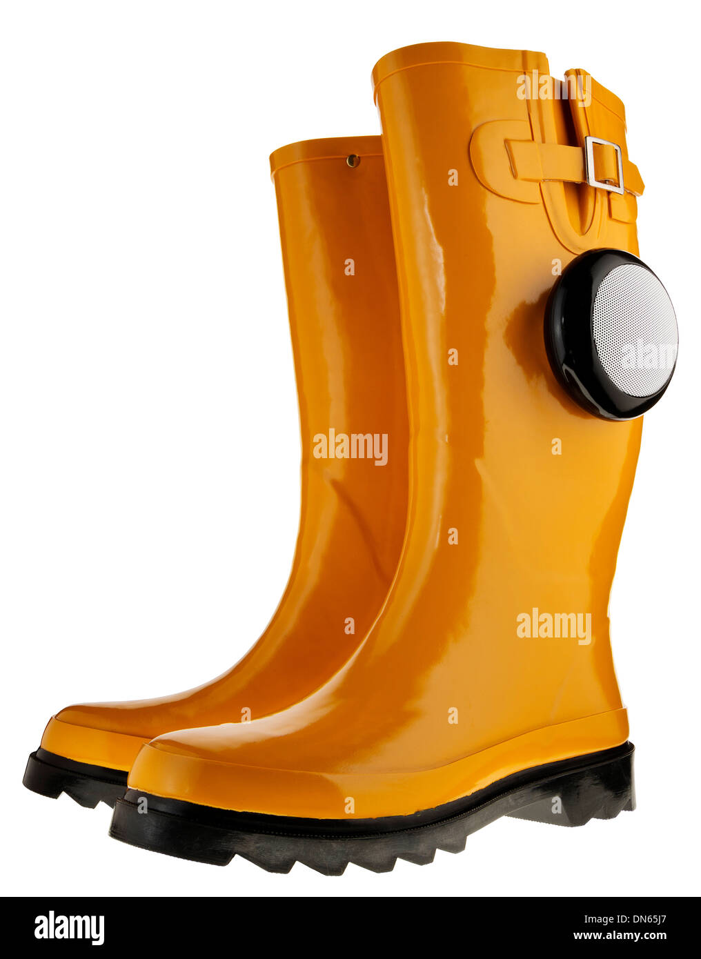 Yellow Wellington boots with bluetooth speaker attached Stock Photo - Alamy