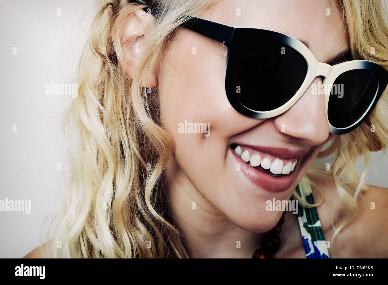 Caucasian woman wearing sunglasses Stock Photo