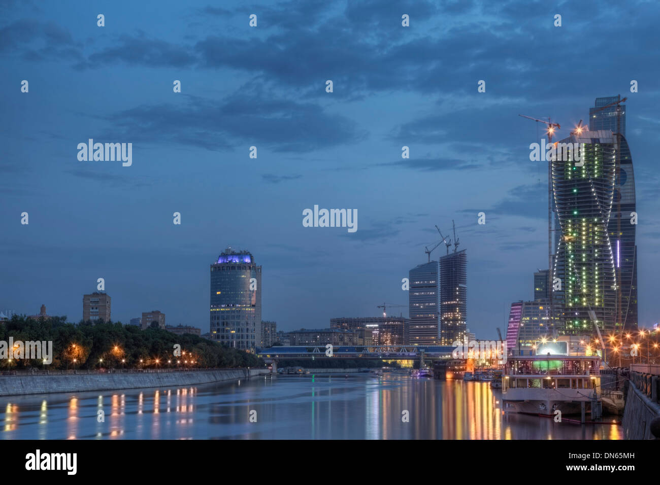 City skyline illuminated at night, Moscow, Russia Stock Photo
