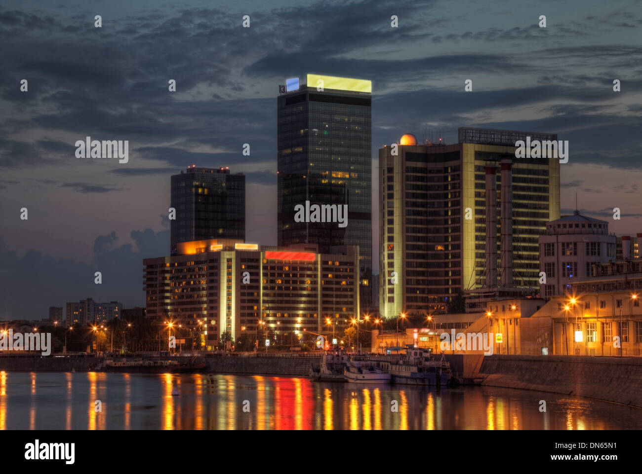 City skyline illuminated at night, Moscow, Russia Stock Photo