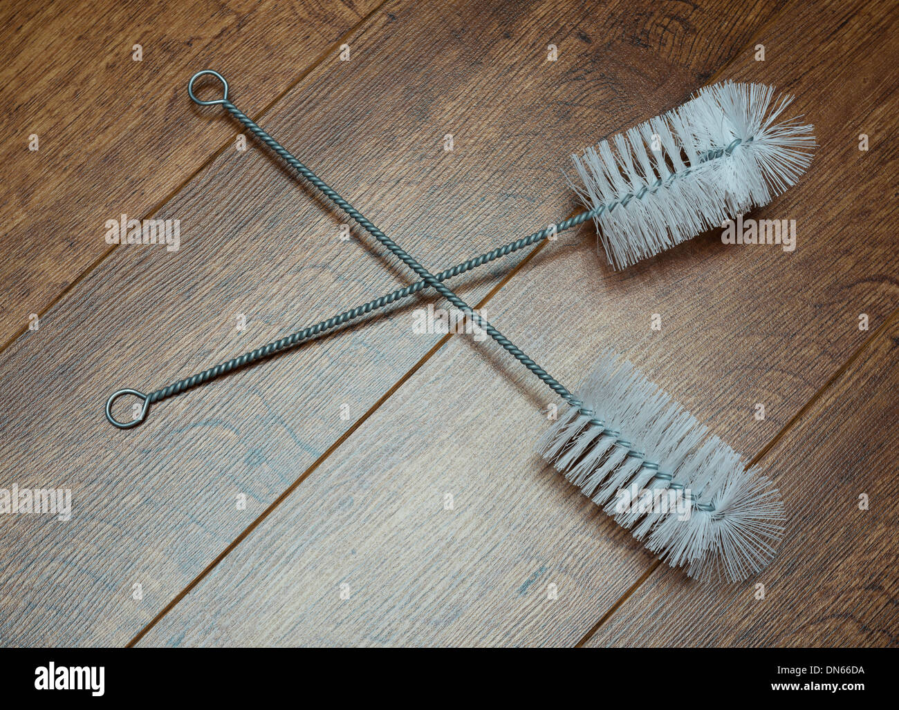 Bottle brushes for cleaning bottles and other tubular items. crossed on